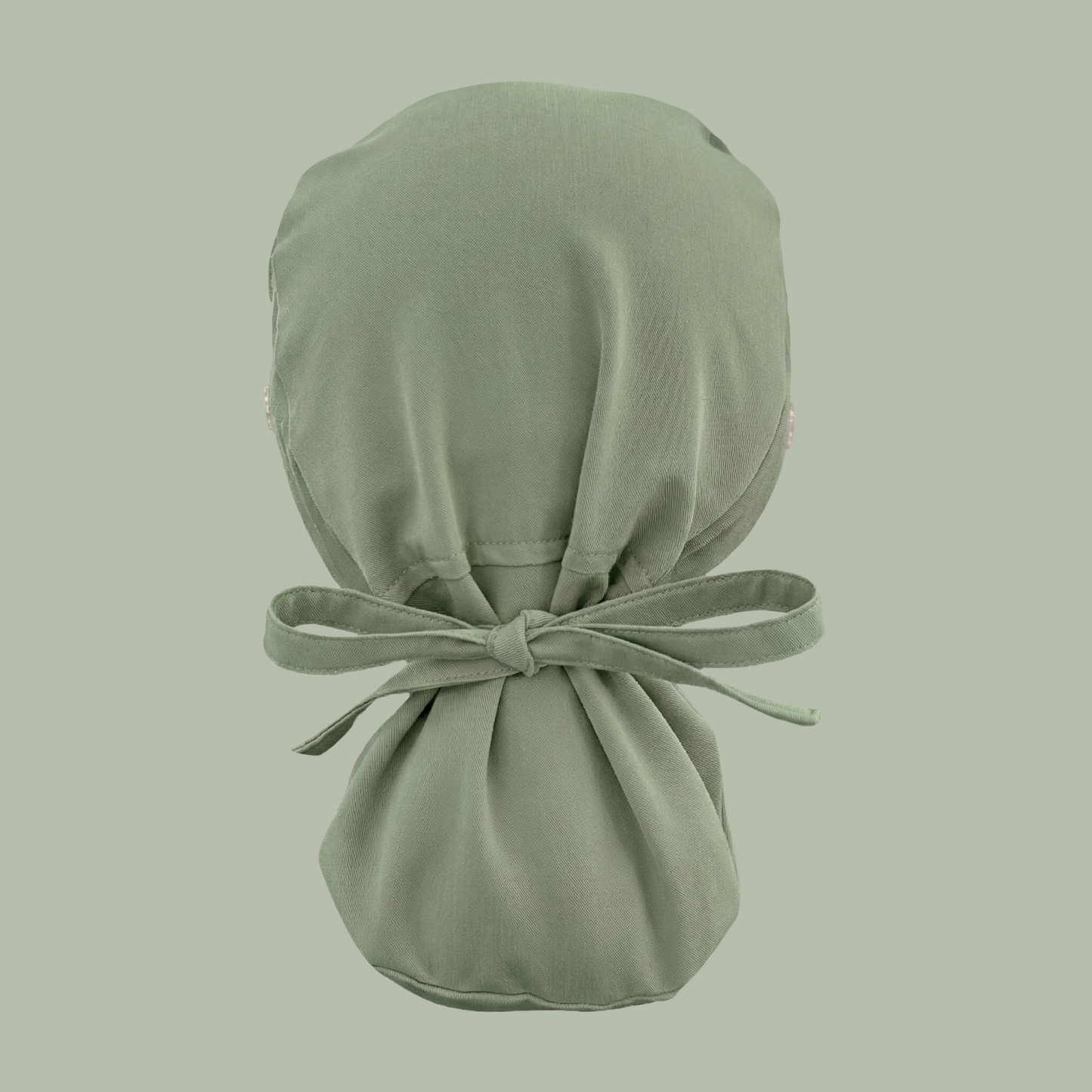 Ponytail cap in solid green rear view