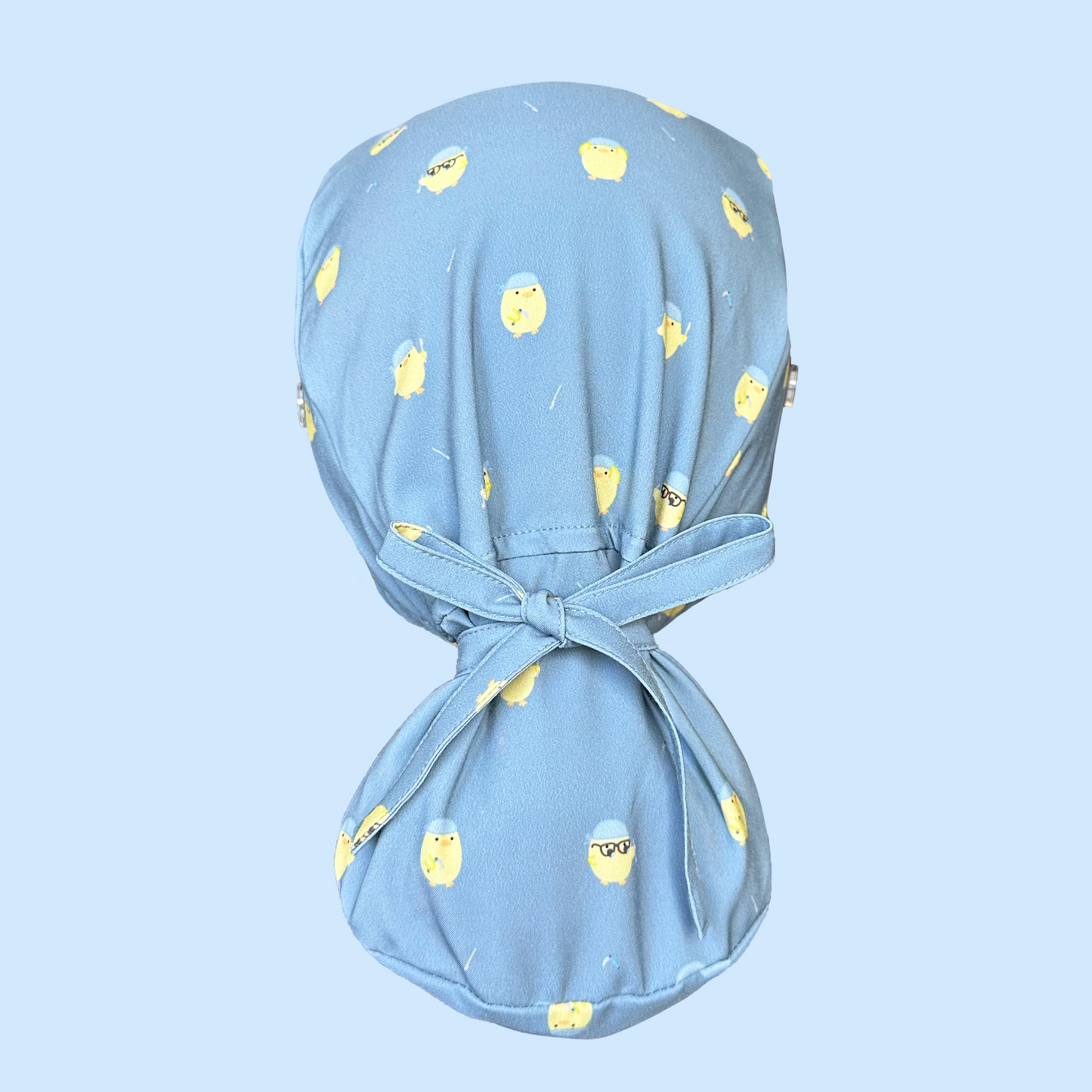 Ponytail Cap rear view in the Healthcare chick print