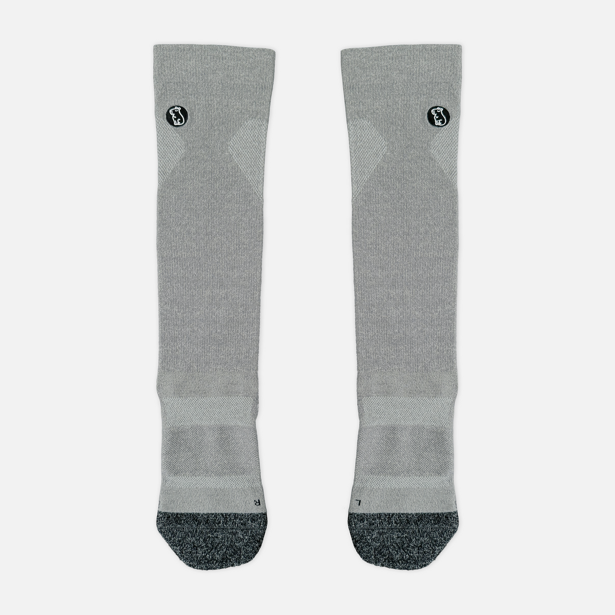 heather grey compression sock with black toe and heel on light grey background