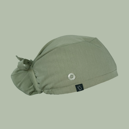 Bun cap in solid green side view