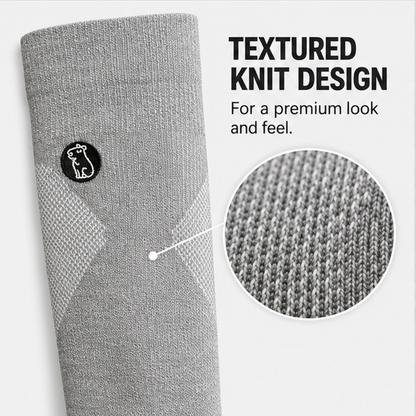 Close-up of the textured knit and capybara patch on Capy Heather Grey compression socks